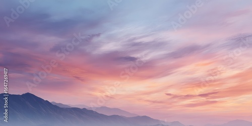 Beautiful sky with a pinkish hue and a few clouds