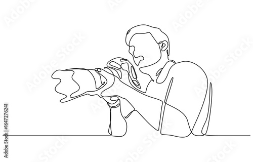 Continuous one line drawing of Photographer holding a camera taking picture vector illustration. Editable outline