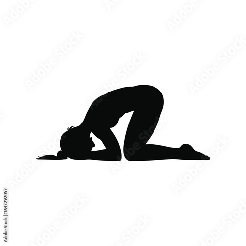 Silhouette of a woman performing a yoga pose on a white background