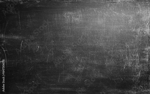 Old black background. Grunge wallpaper. Chalkboard. Grunge. Cement wall texture. 