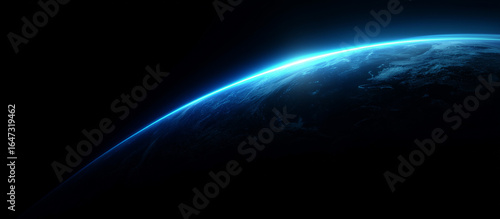 Blue glowing light beam on a black background with an earth shadow. Abstract blue gradient space background with a copy text area for design, banner, wallpaper, or poster. Stock photo, dark atmosphere