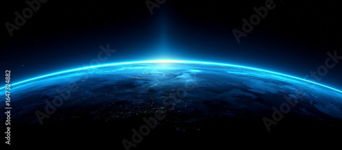 Blue glowing light beam on a black background with an earth shadow. Abstract blue gradient space background with a copy text area for design, banner, wallpaper, or poster. Stock photo, dark atmosphere