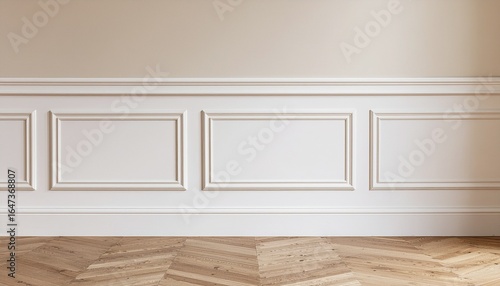 Elegant interior with white wainscoting and beige wall over a herringbone wood floor.