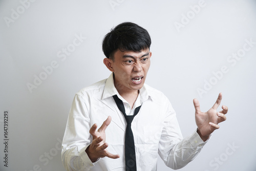 Angry Young Businessman Experiencing Frustration