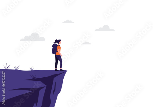 Hiker on Cliff Edge with Backpack Contemplates the View