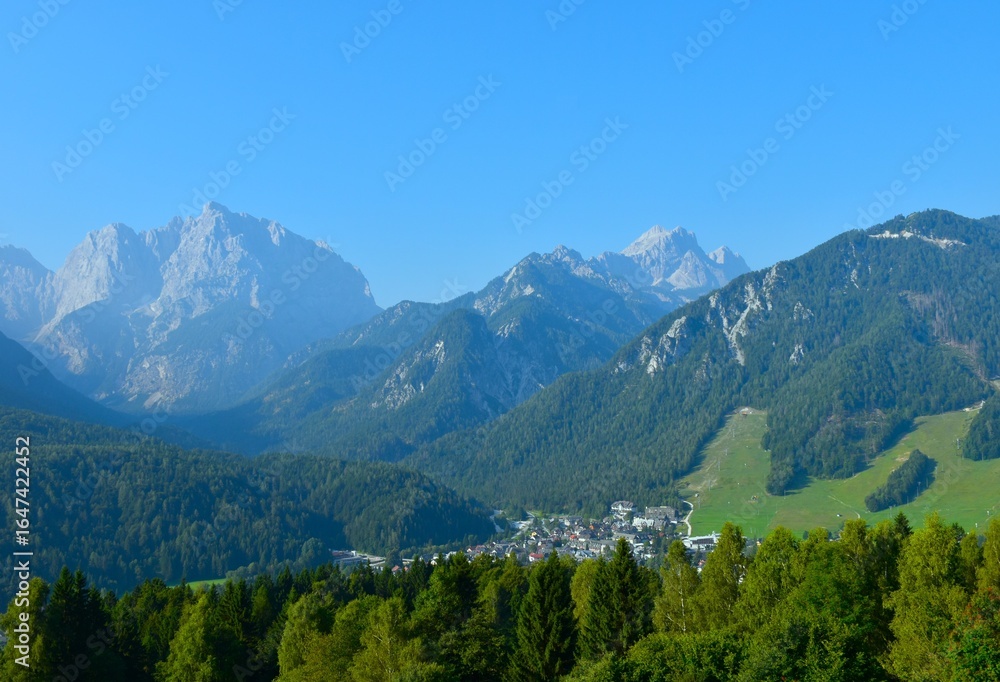 Fototapeta premium View of Kranjska Gora town bellow the mountains in Gorenjska, Slovenia