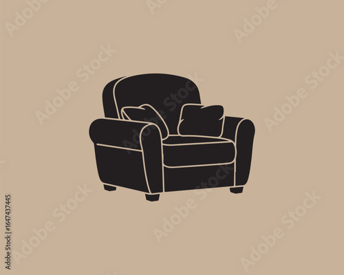 Cozy black armchair with plush cushions on a neutral background