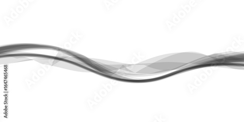 Abstract smoke gracefully curls around a single shiny silver spoon