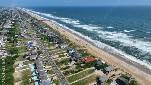 Outer Banks, NC Kill Devil Hills beach houses and real estate on coastline popular summer vacation destination for relaxing by the beach