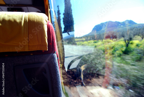 View of a seat from the back and the window.