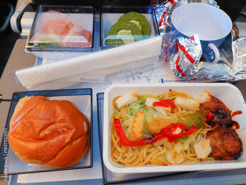 The main course is takoyaki fried noodles in the airplane meal
