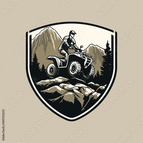 Bold badge-style vector logo of a white man riding an ATV on rocky terrain. Surrounded by pine trees and sharp mountains. Rugged and masculine, with solid black, white, and brown accents.