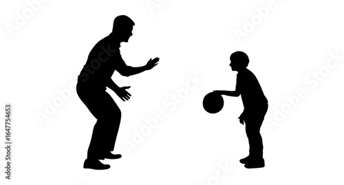 A black and white silhouette of a father and son during a basketball practice.