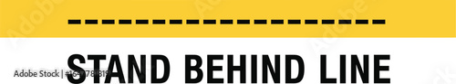 Stand behind line sign with dashed yellow stripe isolated on white background for social distancing, queue management, and safety guidance