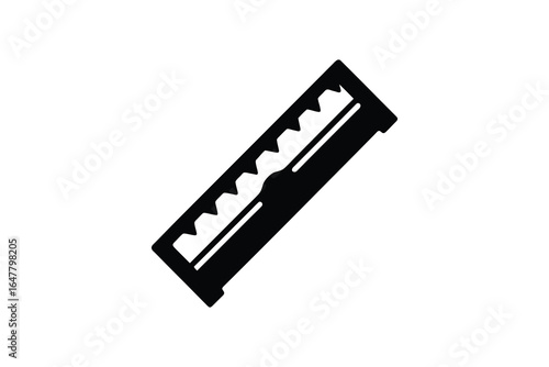 A black and white image of a single edged razor blade silhouette