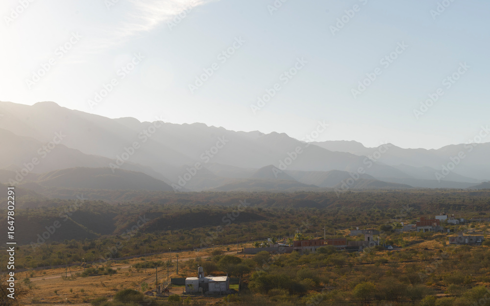 Fototapeta premium Sunset on the mountains during a sandstorm day