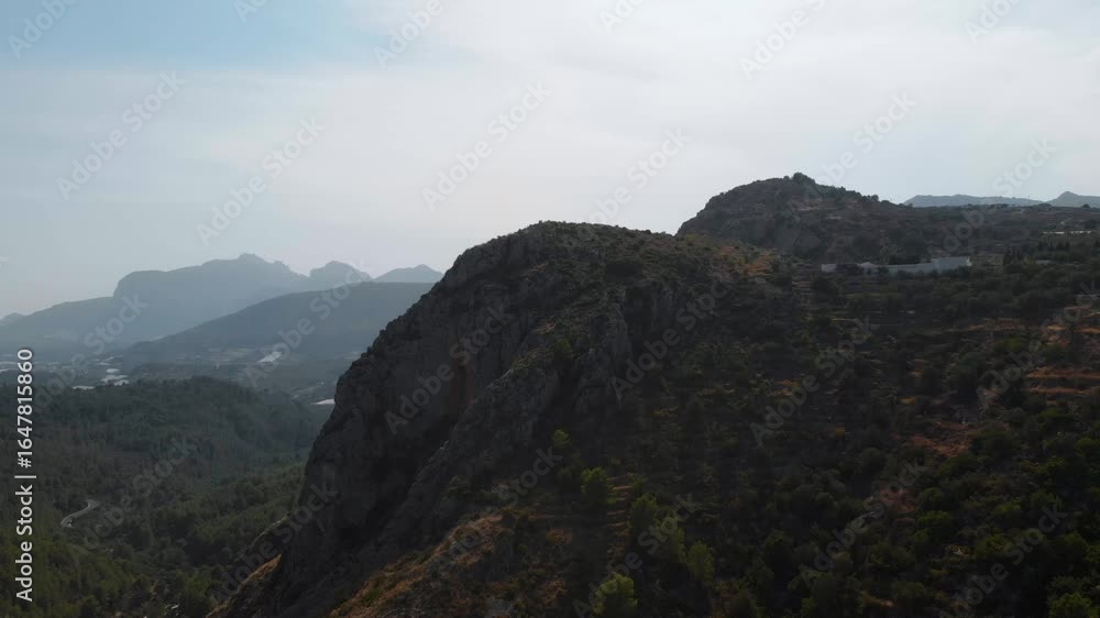 Aerial view of serene mountains and hills in Costa Blanca, Spain Aerial view of serene mountains and hills in Costa Blanca, Spain