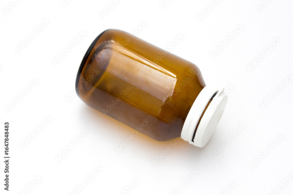 Empty vitamin glass bottle isolated on white background. Empty vitamin glass bottle isolated on white background.