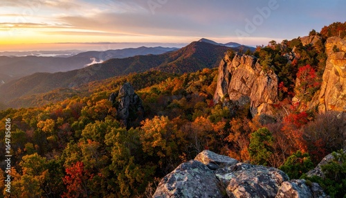 Majestic autumn mountains under sunrise light, panoramic photography of rugged peaks, colorful seasonal tones