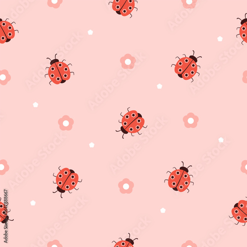 Cartoon ladybug seamless pattern with flowers on pink background.
