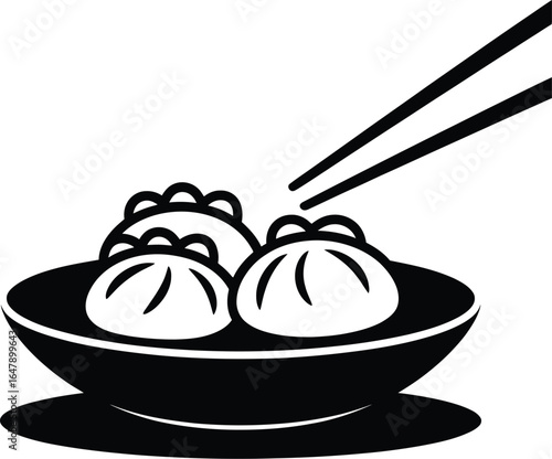 Dumplings in bowl with chopsticks food asian food