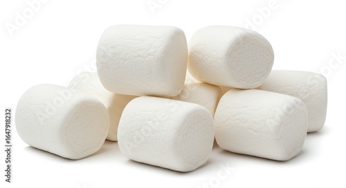 Pile of white fluffy marshmallows isolated on a plain white background sweet confectionery snack food