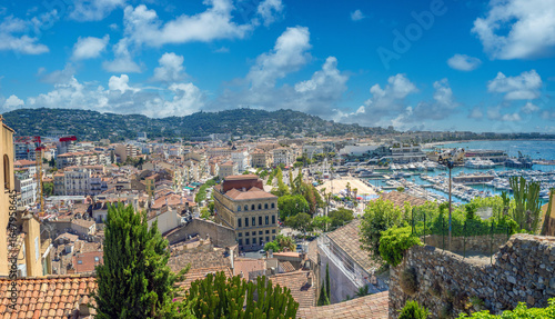 Vew of the city of Cannes front it's old town hill, with its marina, beaches and beach front promenade (la Croisette) clearly visible in the picture,  Cannes, Côte d'azur, France