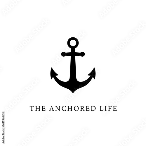 A simple black anchor design with the words the anchored life below it