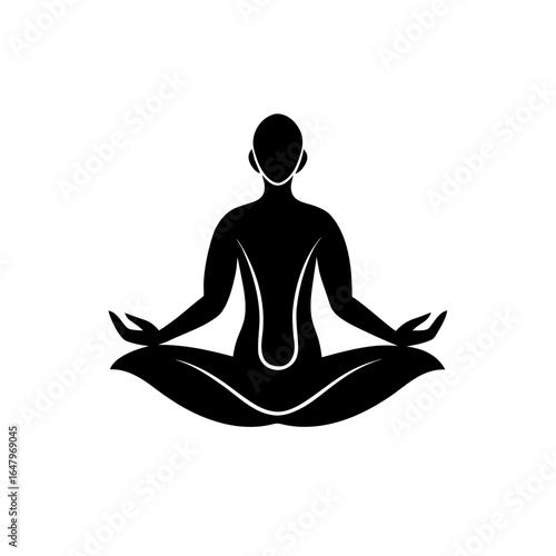 Silhouette of person meditating in lotus position yoga