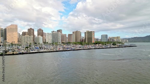 Aerial Drone Footage Showcasing Ala Wai Harbor with the Iconic Honolulu Cityscape and Majestic Diamond Head Crater in the Background