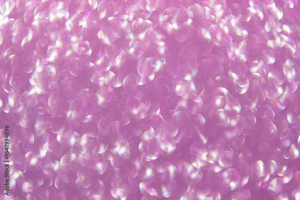 Fototapeta premium Defocused shimmer. Bokeh backdrop shimmer. Bokeh effect. Glitter shine. Bokeh shimmering background. Blurred defocused background. Blur glitter backdrop. Glitter shimmer background. Glitter glows