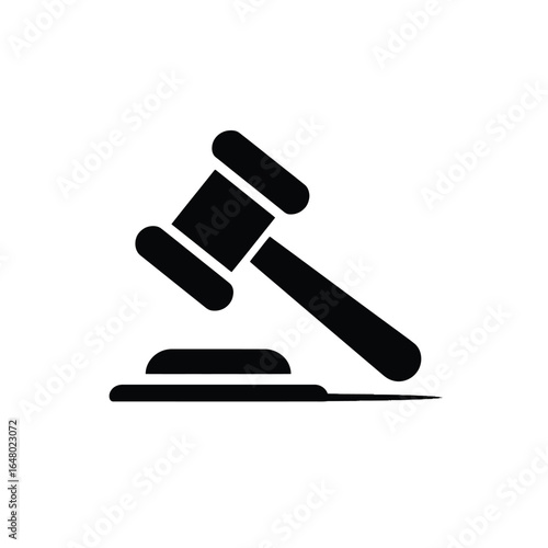 Gavel striking a sound block, a symbol of justice and legal proceedings