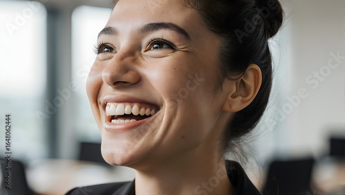 Confident woman with freckles smiling at office