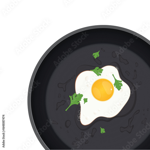 Overhead shot showing a fried egg in a black pan. Bright yellow yolk, cooked egg whites, and parsley garnish. Breakfast scene of a simple, prepared meal.