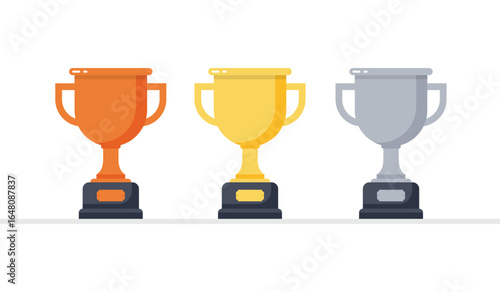 A trio of trophies shines brightly on a white background, celebrating victory and success. Bronze, gold, and silver awards symbolize effort, dedication, and ultimate triumph.