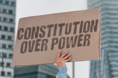 Quadro em tela “Constitution Over Power — Uphold foundational law” during a civic rally