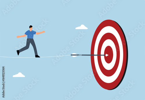 Challenge to overcome difficulty and achieve business target, businessman acrobat walk on rope to reach bullseye dart target
