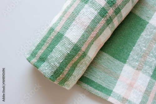 Fotografía Green and White Checkered Cotton Kitchen Towel on Light Background