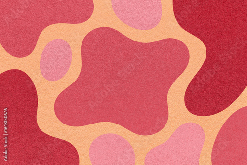 Abstract red, pink and coral background with amorphous shapes and spots, paper texture in flat organic design