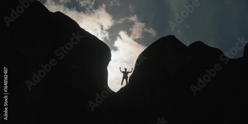 Silhouette of mountain climber 