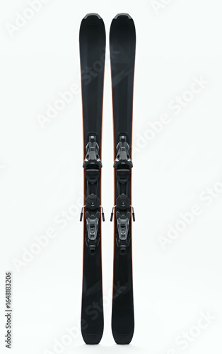 Black alpine skis with orange trim and mounted bindings isolated rear view showing base design for winter sports catalog