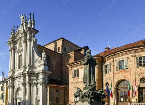 Church of Sant'Andrea, Palazzo Comunale (Town Hall Palace) and statue of Saint Giuseppe Benedetto Cottolengo, in Piazza Caduti per la Libertà, Bra (Cuneo), Piedmont, Italy