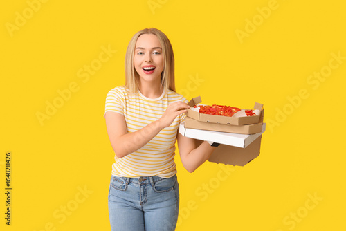 Young woman holding cardboa...