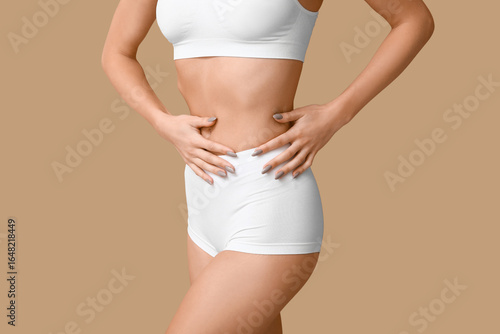 Young woman in underwear on...