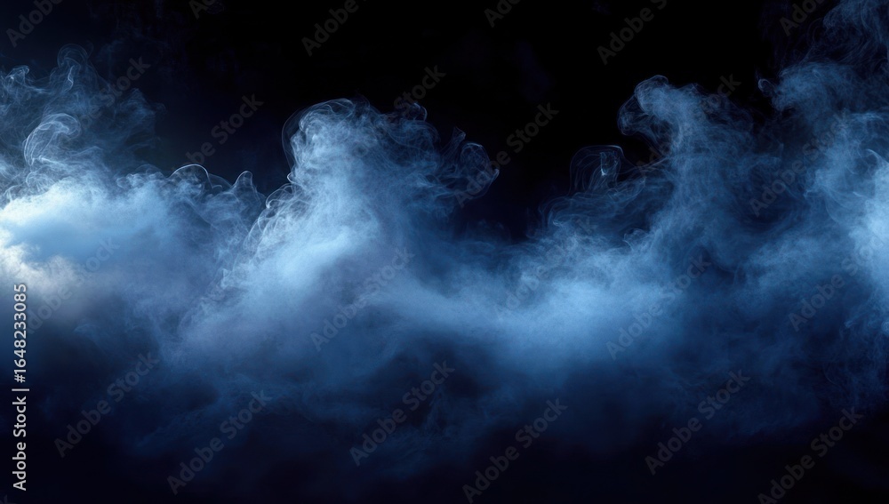 Fototapeta premium Thick blue smoke swirling and curling against a dark black background creating a mysterious and ethereal atmosphere