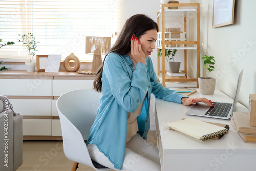Young woman with otitis fee...
