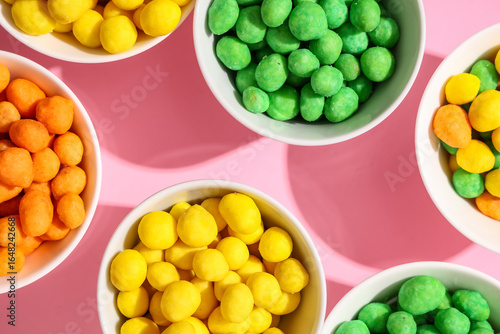 Bowls with colorful coated ...