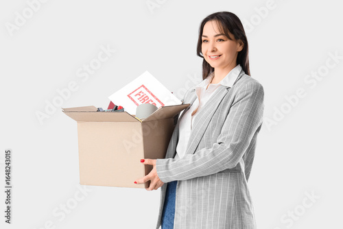 Happy fired businesswoman h...