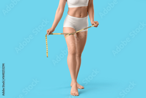 Young woman in underwear wi...