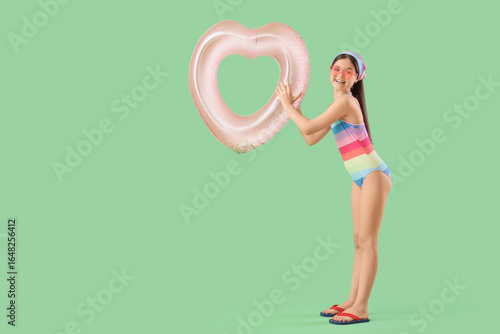 Happy young girl in colorfu...